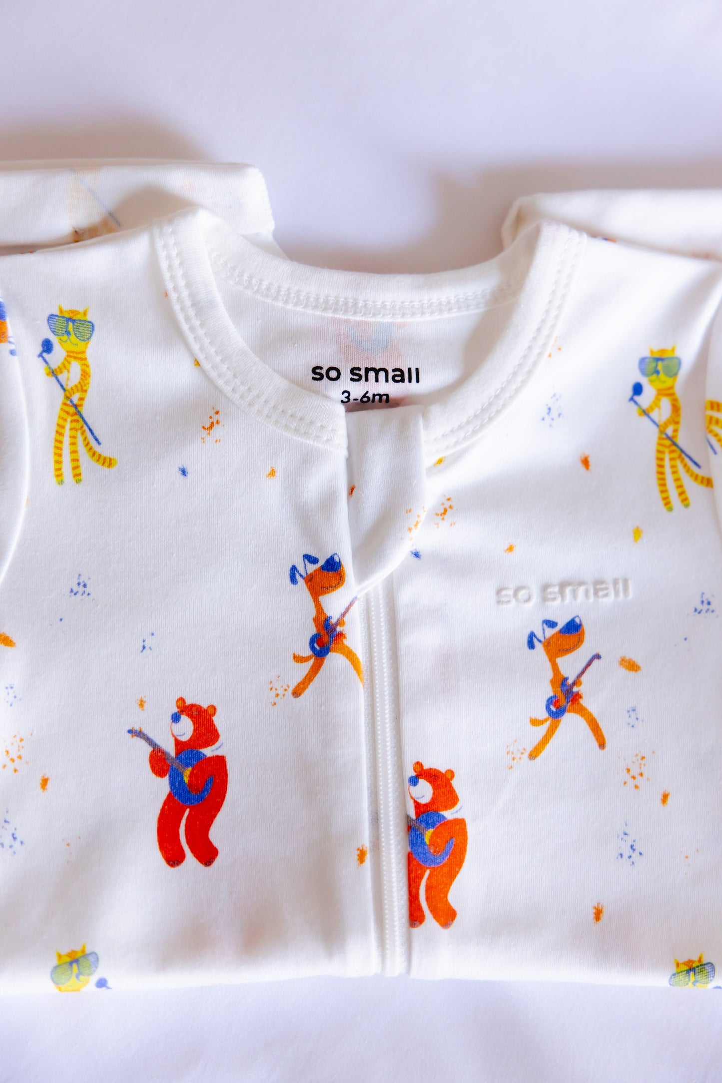 طقم قطعة واحدة نصف كم بسحاب من القطن العضوي الفاخر- تصميم حفلة