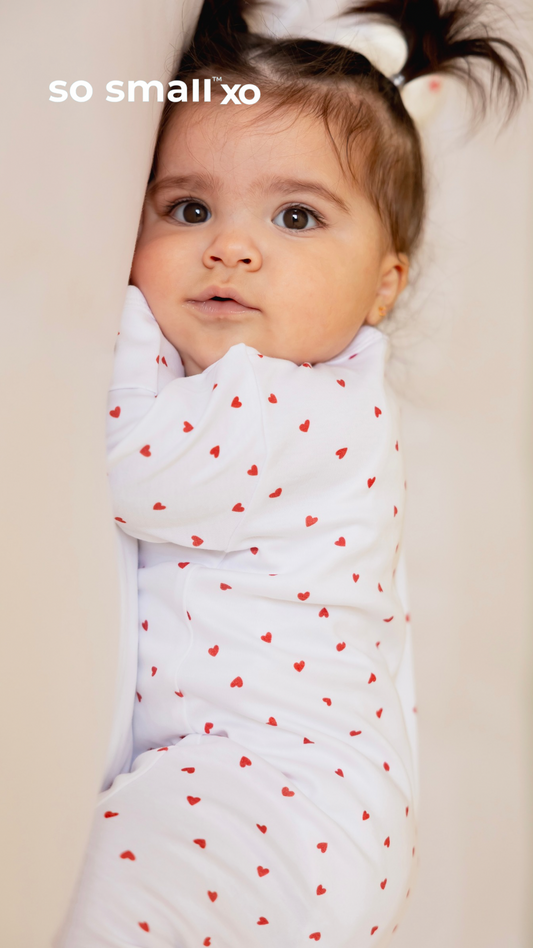 so small xo Zipper Footie- Tiny Hearts