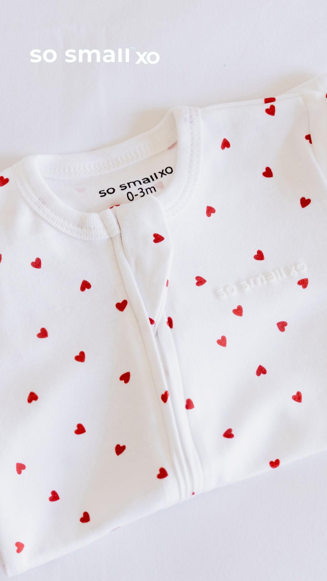so small xo Zipper Footie- Tiny Hearts